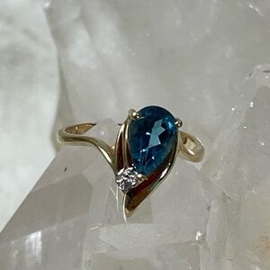 14k genuine blue topaz ring with diamond accent